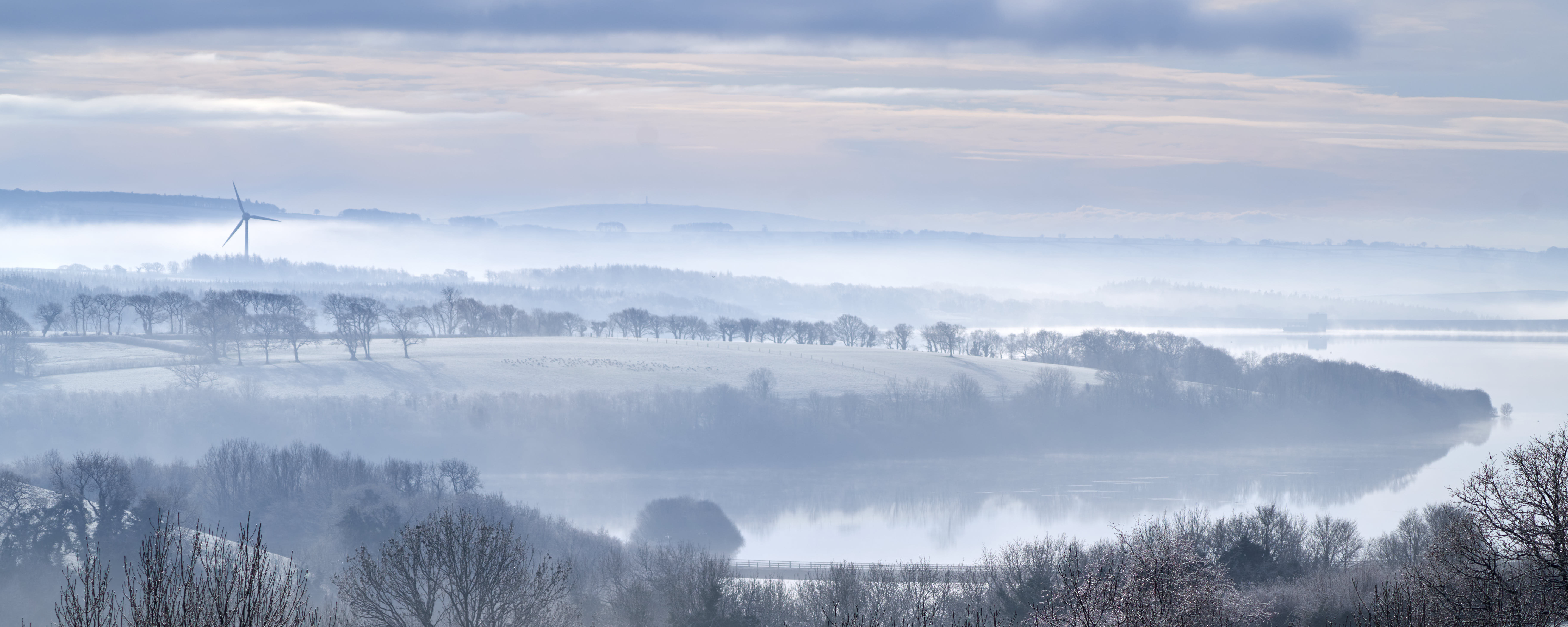 Photo of mist filling Roadford lake valley